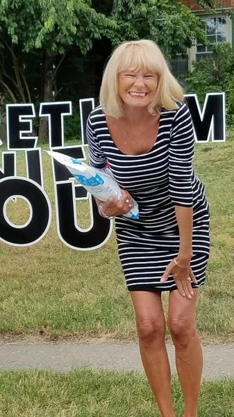 Anne Jasser smiling for retirement party