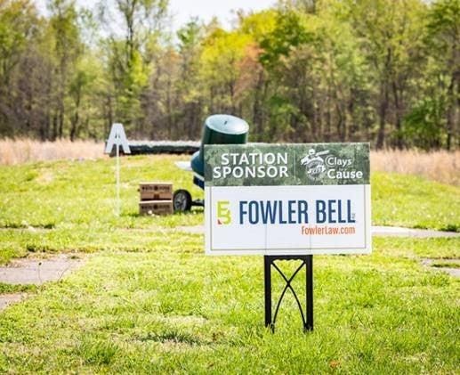 Clays for a Cause sign featuring Fowler Bell